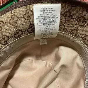 GUCCI Brown Canvas Bucket Hat with complete inclusions in size 57 or small Gucci GG Reversible Bucket Hat Nylon Canvas Brown Small 57  main image 3